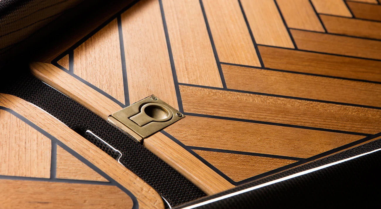 The canoe has a storage compartment in the deck