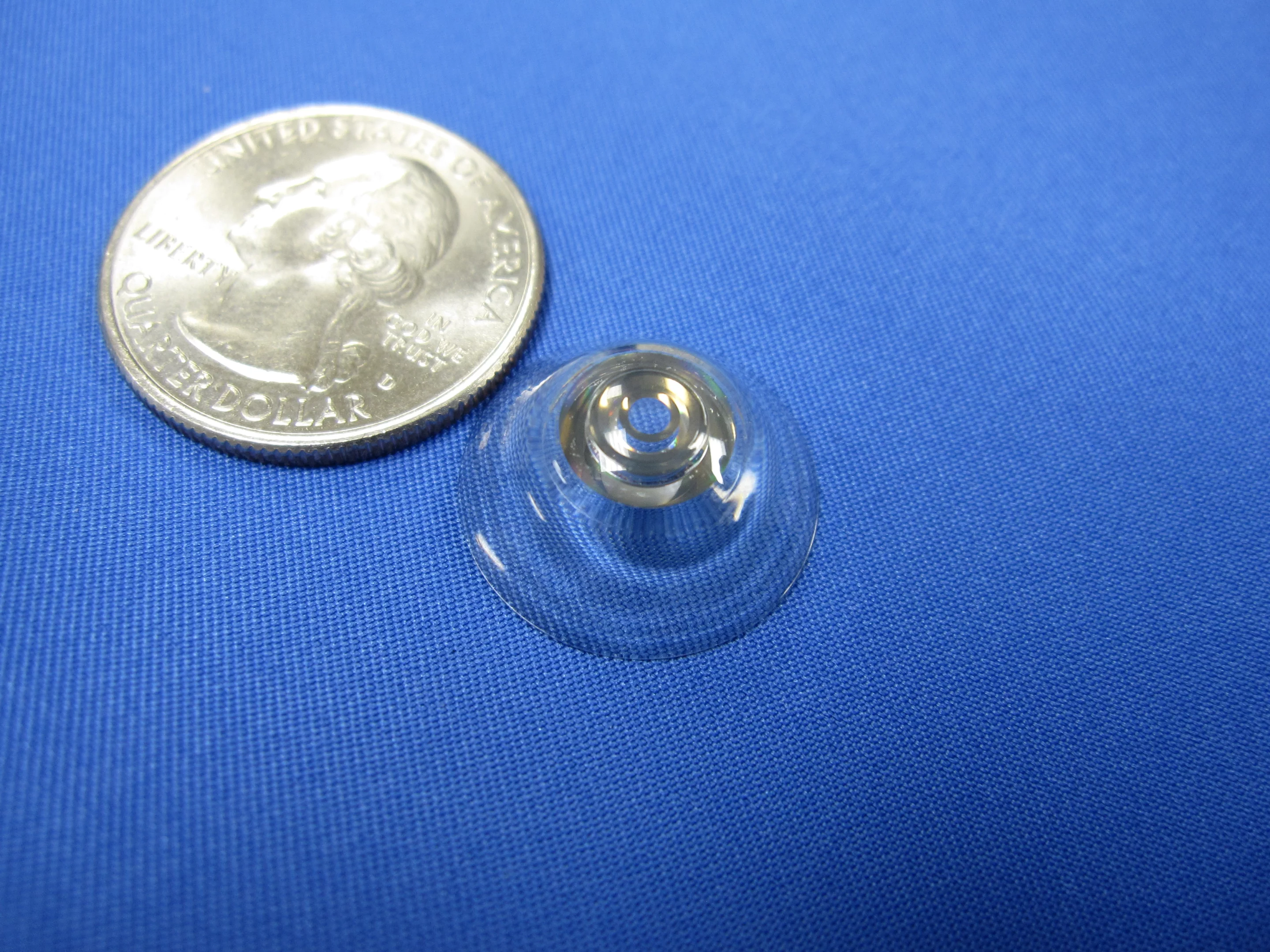 Prototype telescopic contact lenses may one day help sufferers of age-related macular degeneration (Photo: Eric Tremblay and Joe Ford/ EPFL)