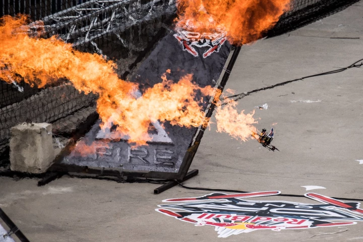 The racing drones hit speeds of up to 150 km/h (93 mph) throughout Red Bull's inaugural drone racing event and had to contend with flames, waterfalls and blasts of air pressure
