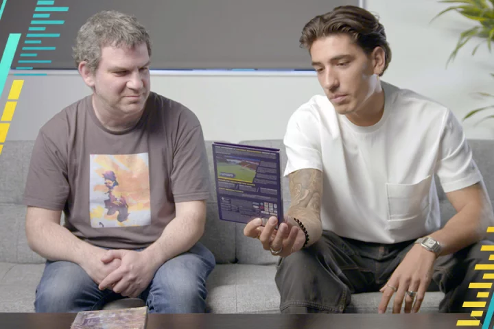 Sports Interactive director Miles Jacobson and Hector Bellerin with the company's recyclable game packaging