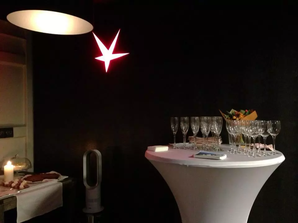 The lounge container is setup like a breakfast nook for guests to enjoy a cup of coffee or glass of wine together