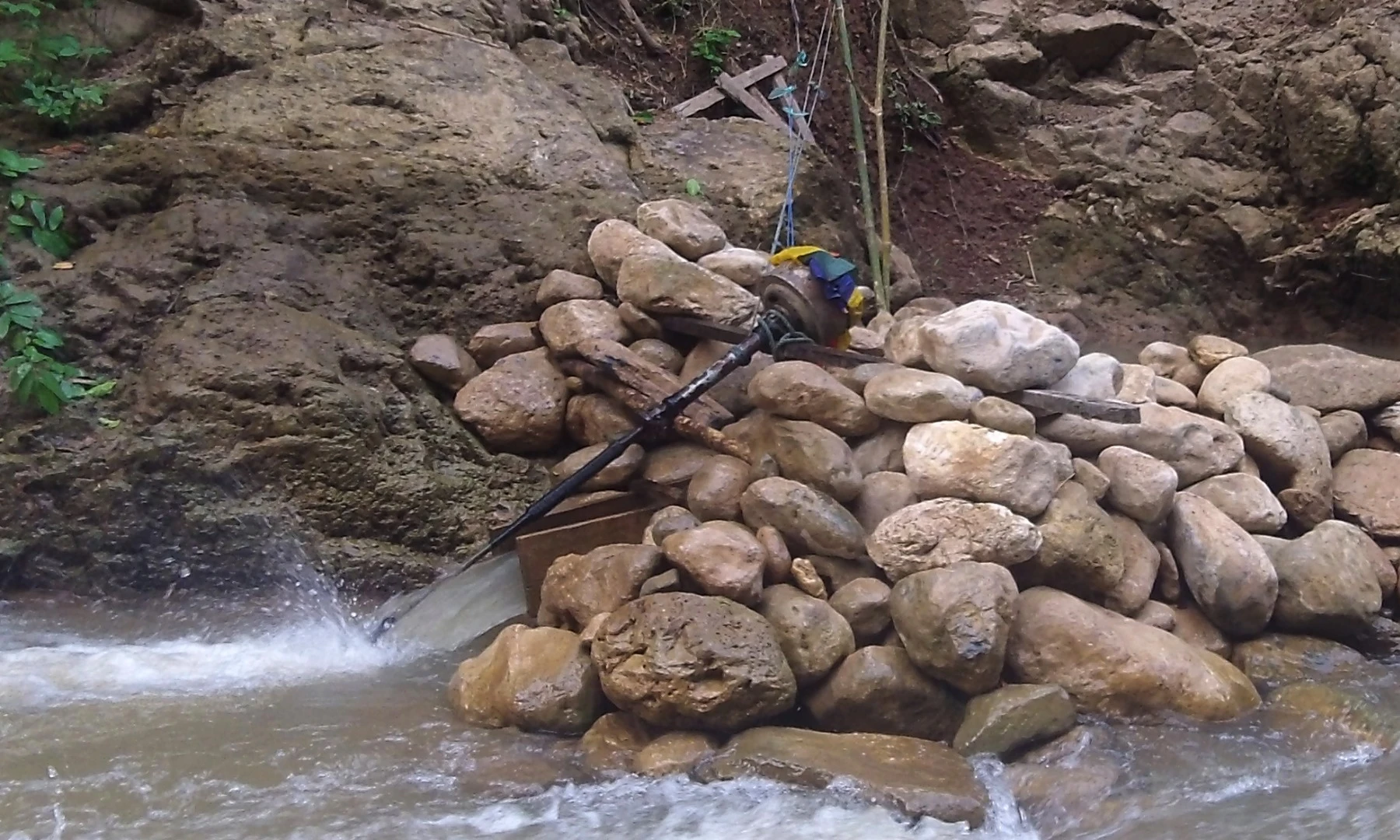 It's only in the last few years that villagers have developed their own micro-hydro-electricity schemes. This generator supplies around 80 watts of power to one household. Each of the nearby streams had multiple such generators, each supplying one household, with the cables stretched for hundreds of metres across the top of the jungle canopy.