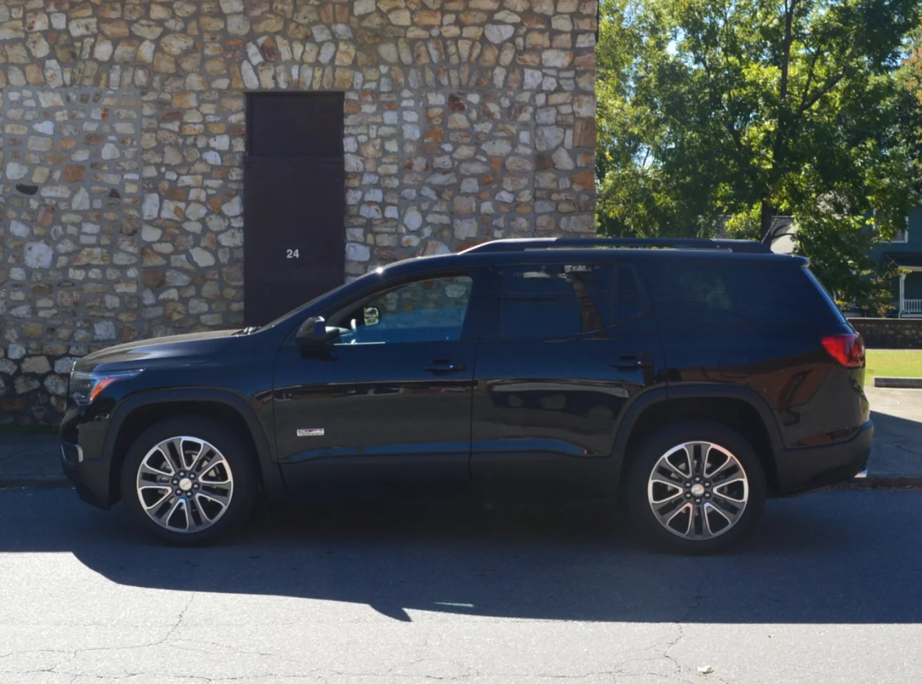 The new Acadia has smaller packaging but still looks like a tough, truck-like SUV