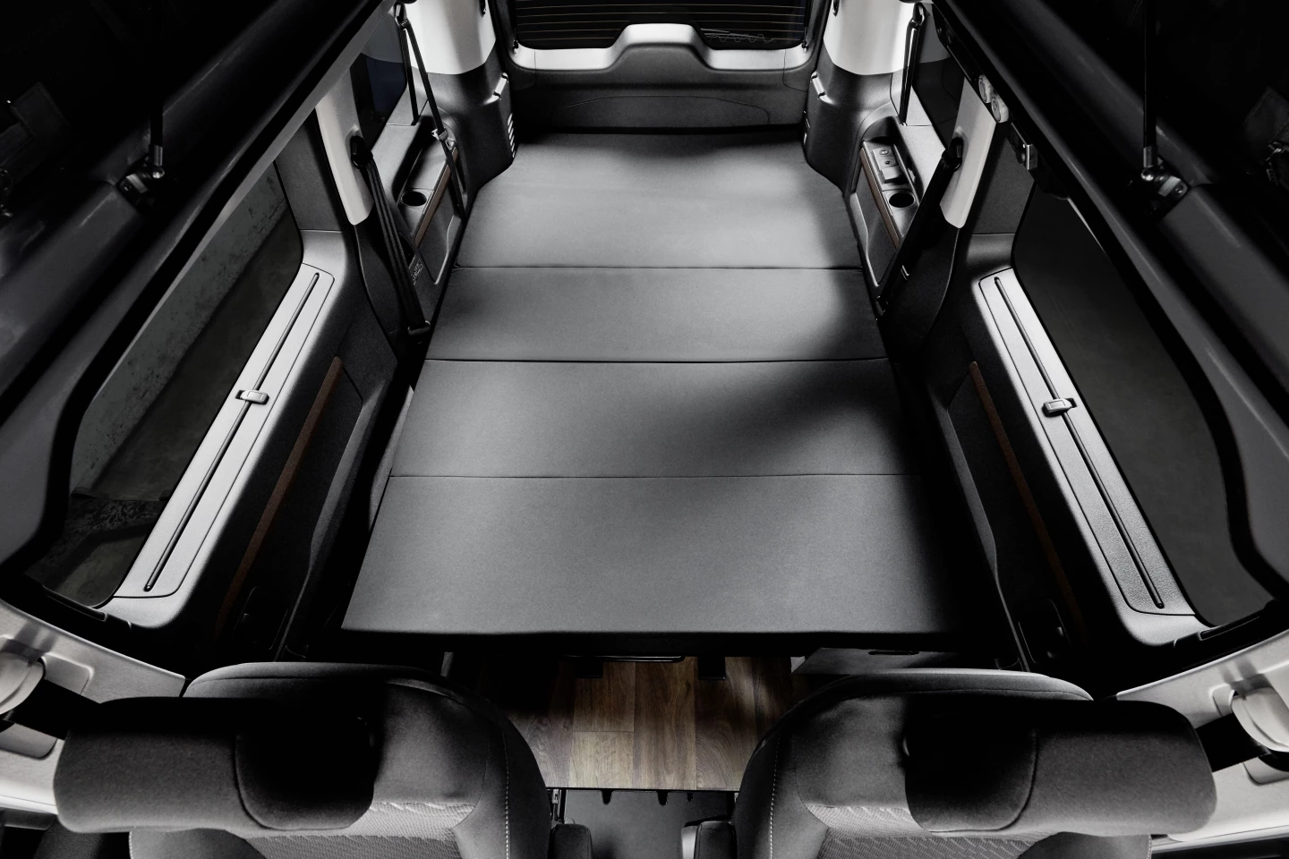 By eliminating the side kitchen, Crosscamp makes room for a full-width bed