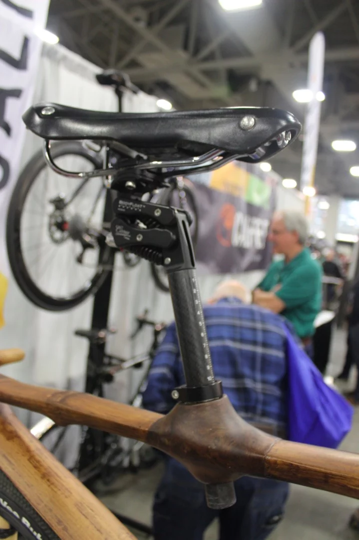The bike features a suspension seatpost