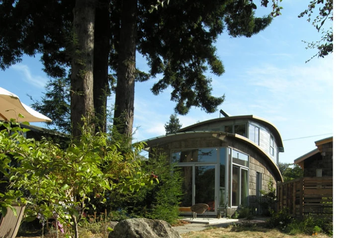 The upper outside walls of the McGee house are made from over 100 salvaged car roofs