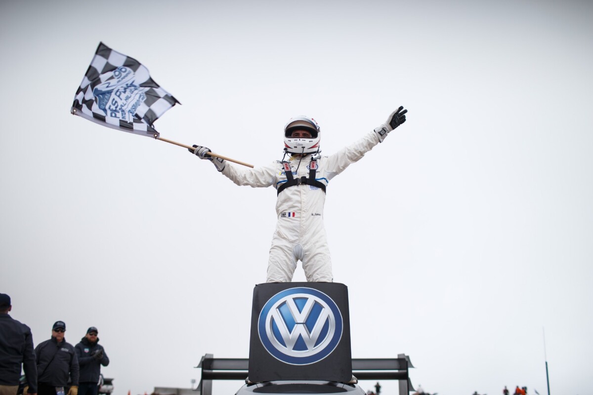 Romain Dumas celebrates his historic win