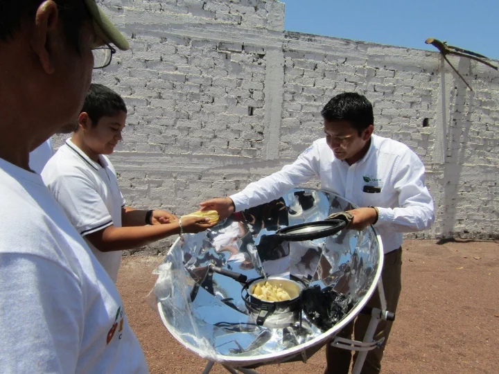 The team's solar stove, made up of a central container coated in a soot paste to increase solar heat absorption