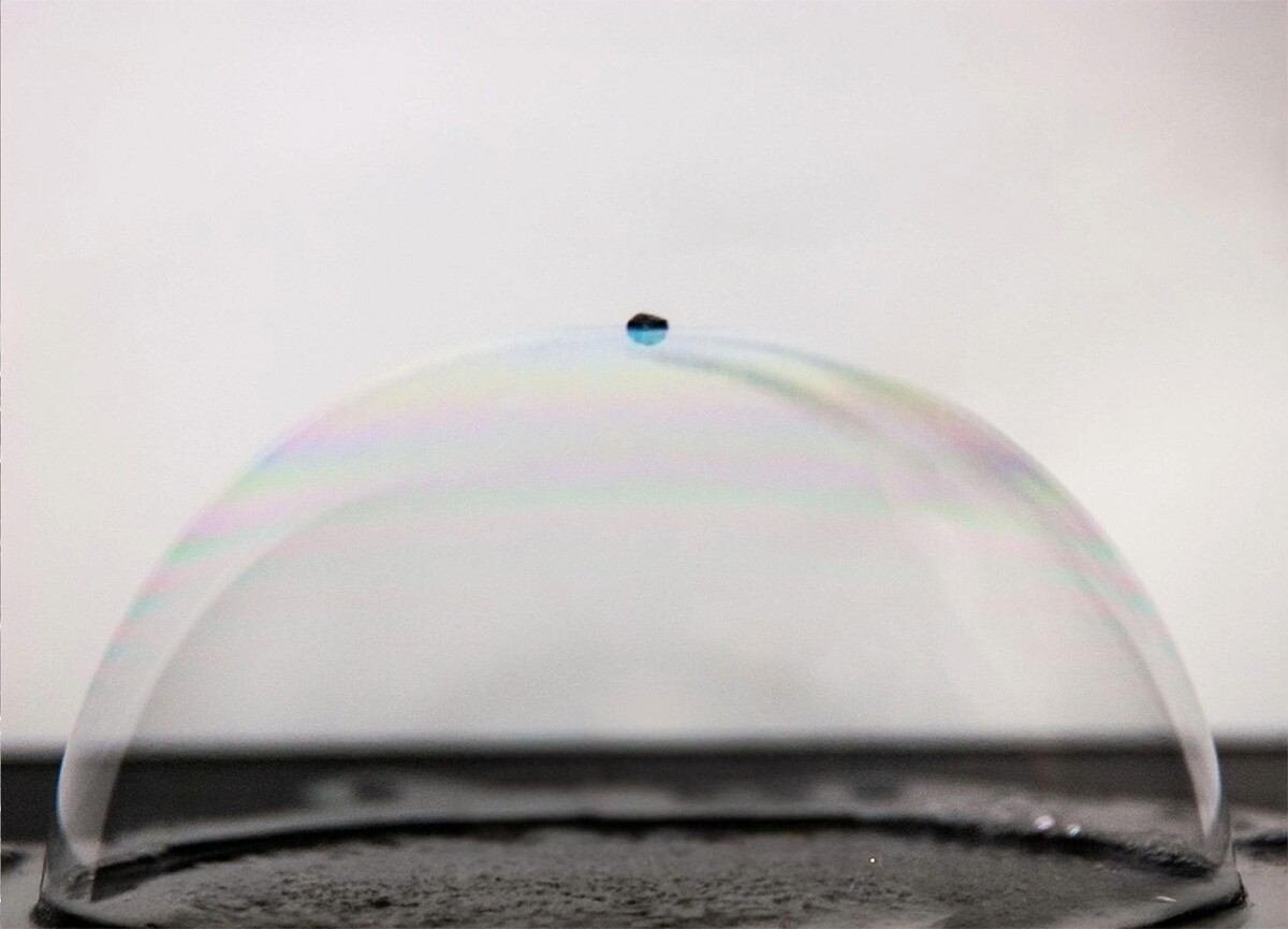An ultralight carbon nanolattice consisting of 18.75 million lattice cells resting on a bubble