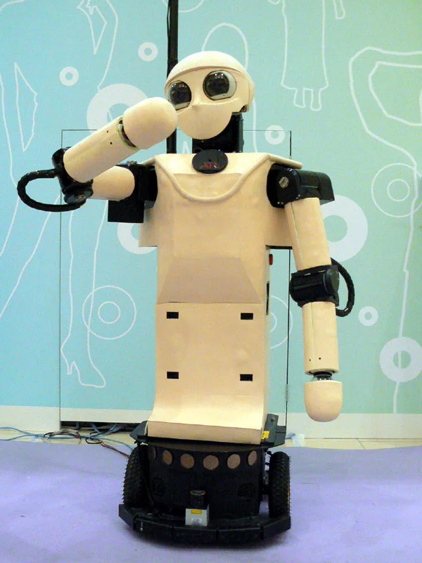 This version of Robovie met with people in a shopping mall, and was covered with touch-sensitive padding