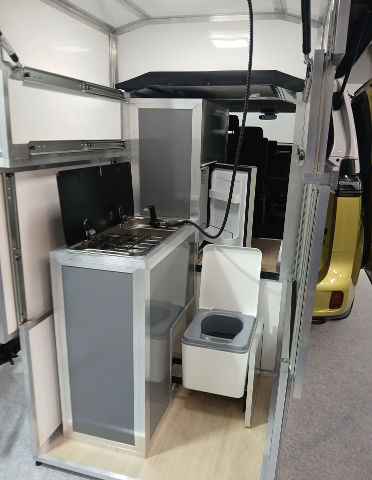 The fridge is located inside the upper module