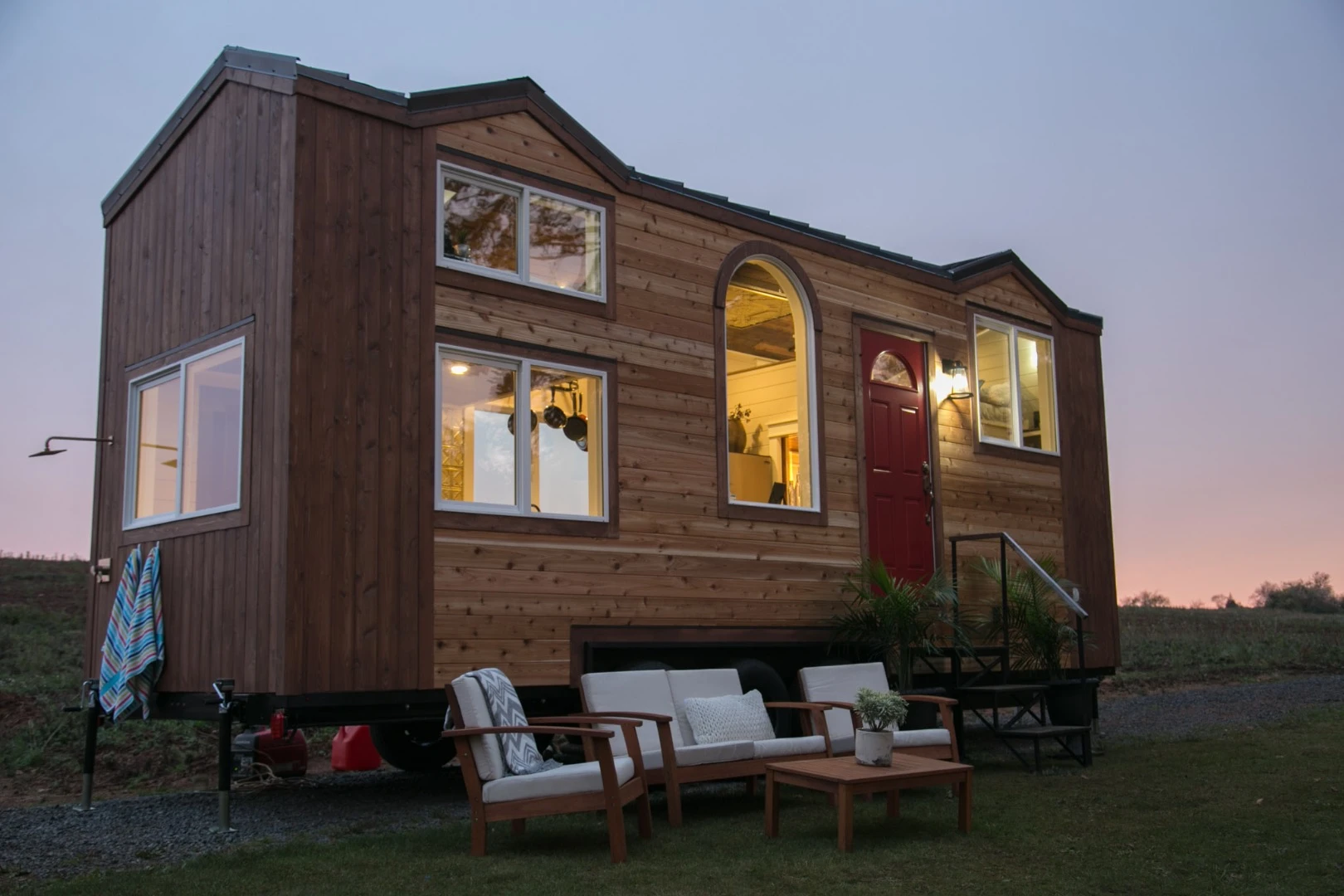 The Theater Home is clad in two-tone cedar siding