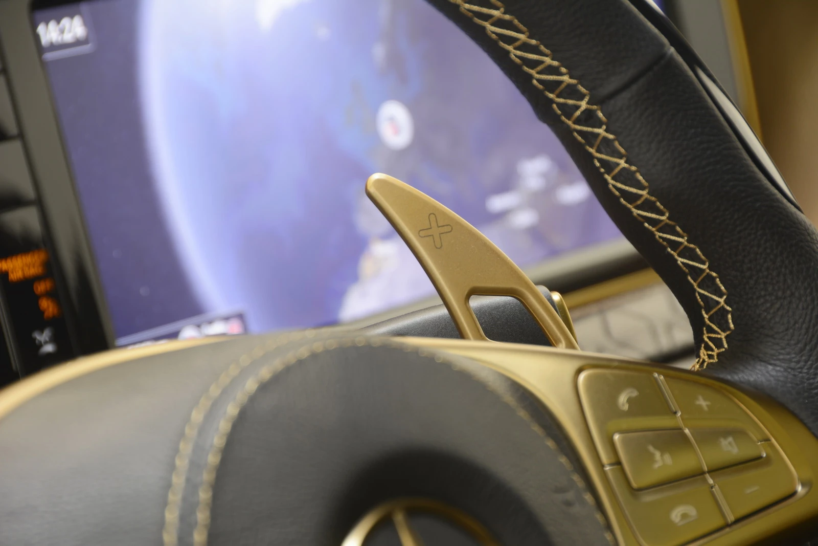 Some of the 300 interior parts of the Brabus 900 Desert Gold painted to match the exterior.
