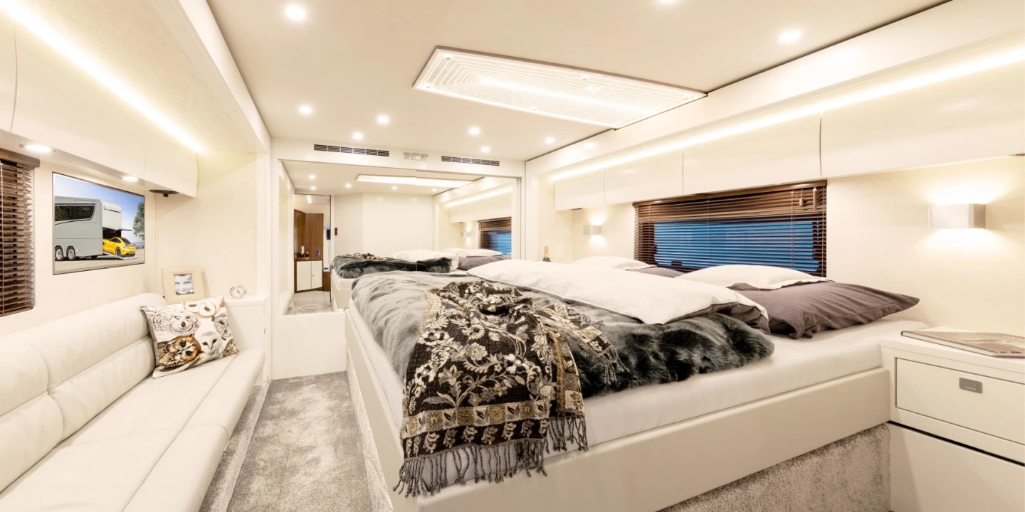 The dual bedroom slide-outs create a spacious master suite with both bed and sofa
