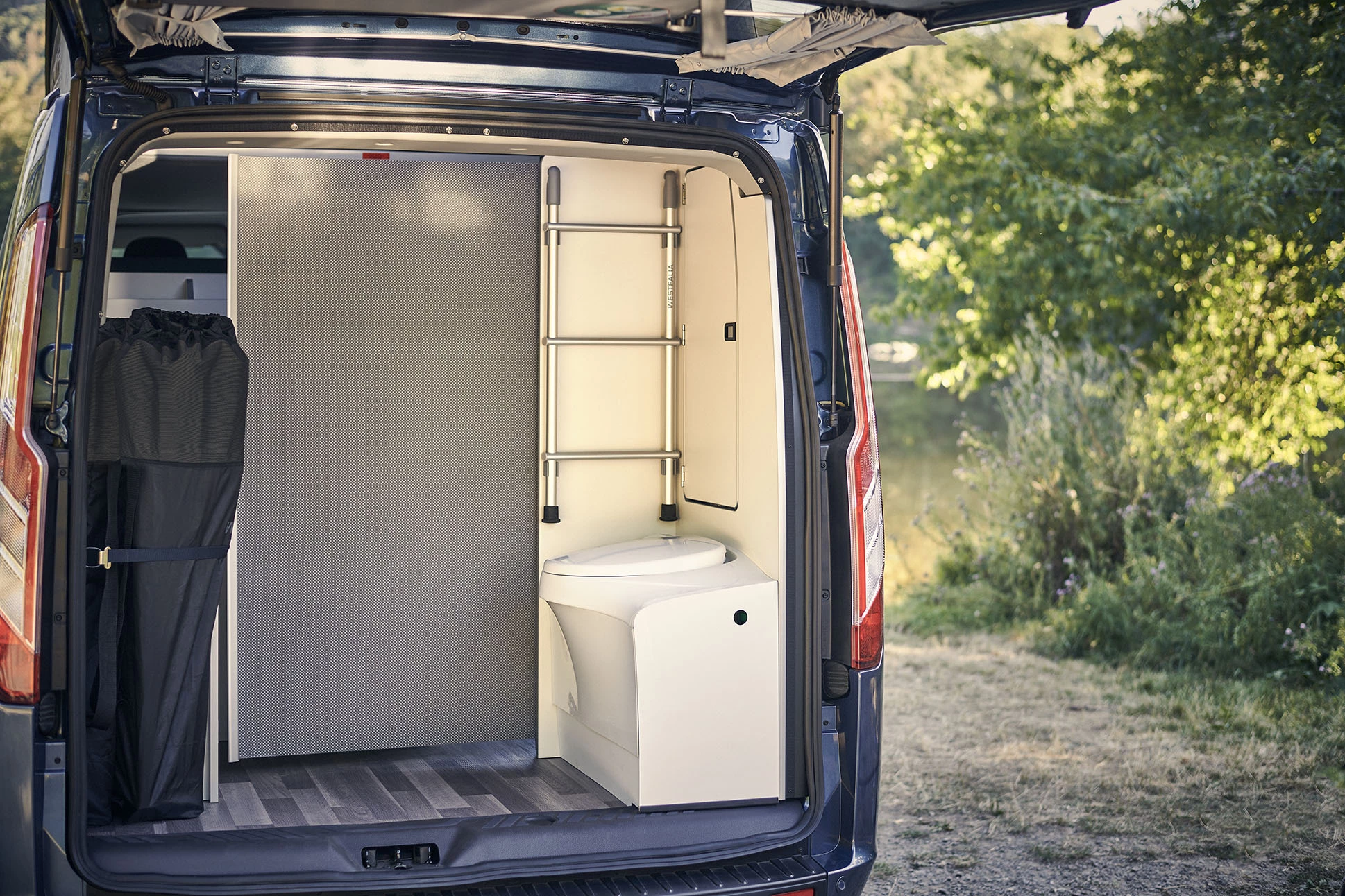 The pull-out divider creates some privacy for the Nugget Plus bathroom occupant