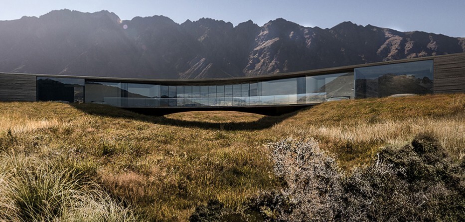 X_House, Auckland, New Zealand by Monk Mackenzie Architects. A winner under the "Private Homes" category of the 2018 International Architecture Awards, this structure is anchored at four points but arches to bridge a natural watercourse running through The Remarkables mountain range
