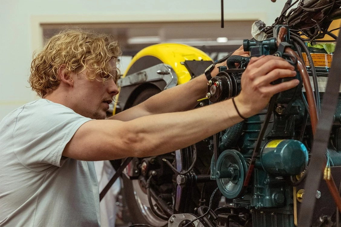 In addition to working on the bike from scratch, redesigning the engine to run on fry grease, and cramming it into the Harley frame, the team of students collaborated with UBC's 400-vehicle fleet operator to develop cold-climate-compatible biodiesel technology