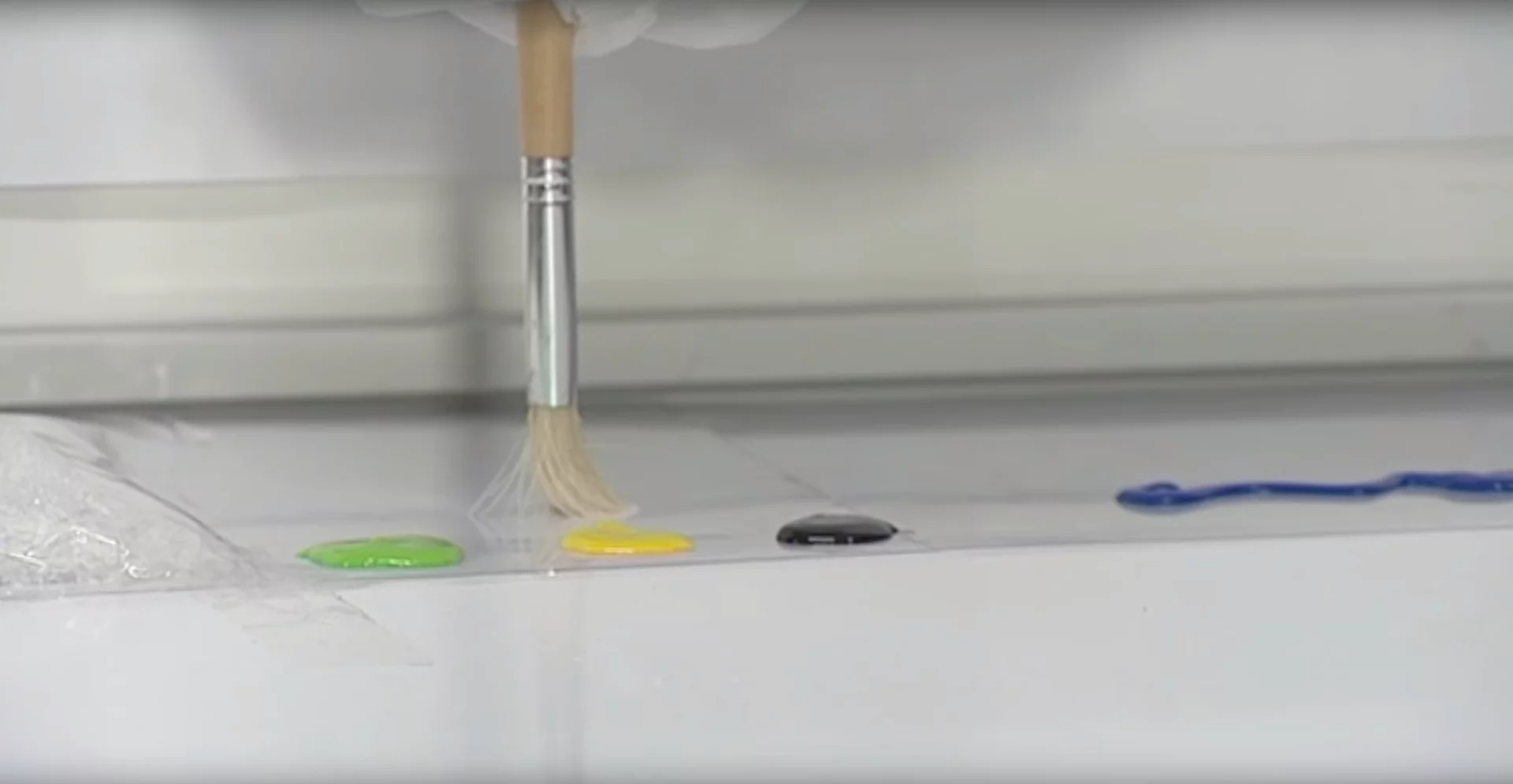 To change colors, the subject blinks three times which sees the tip of the brush poised over three different options, from where they simply look at the color they want