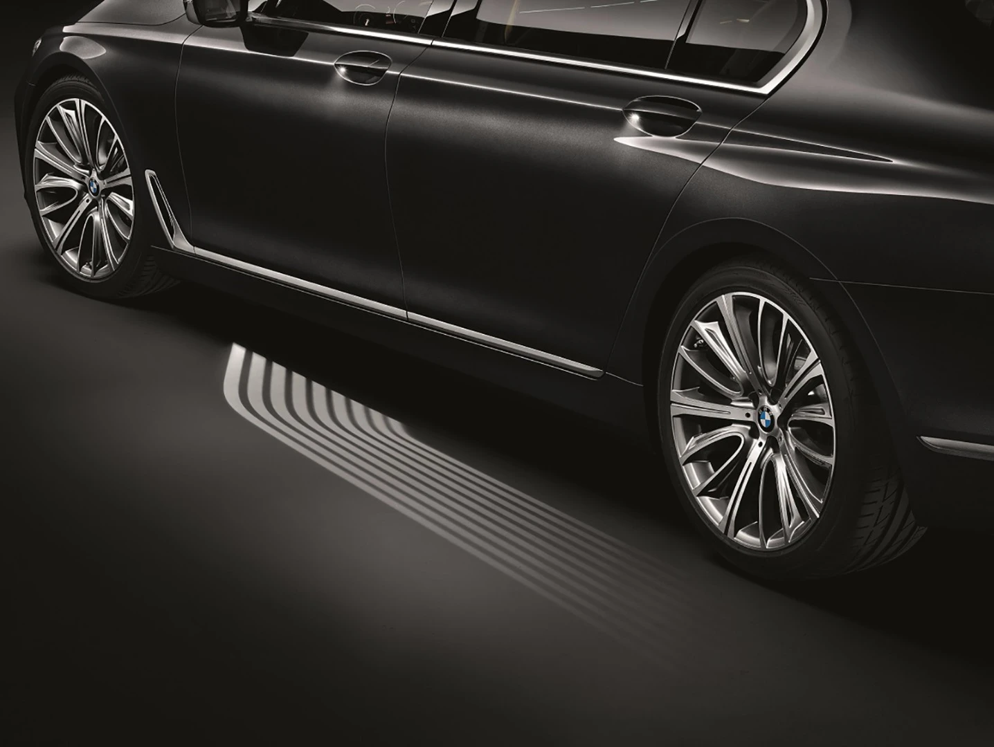Microlenses project light onto the entry area of the new BMW 7 Series