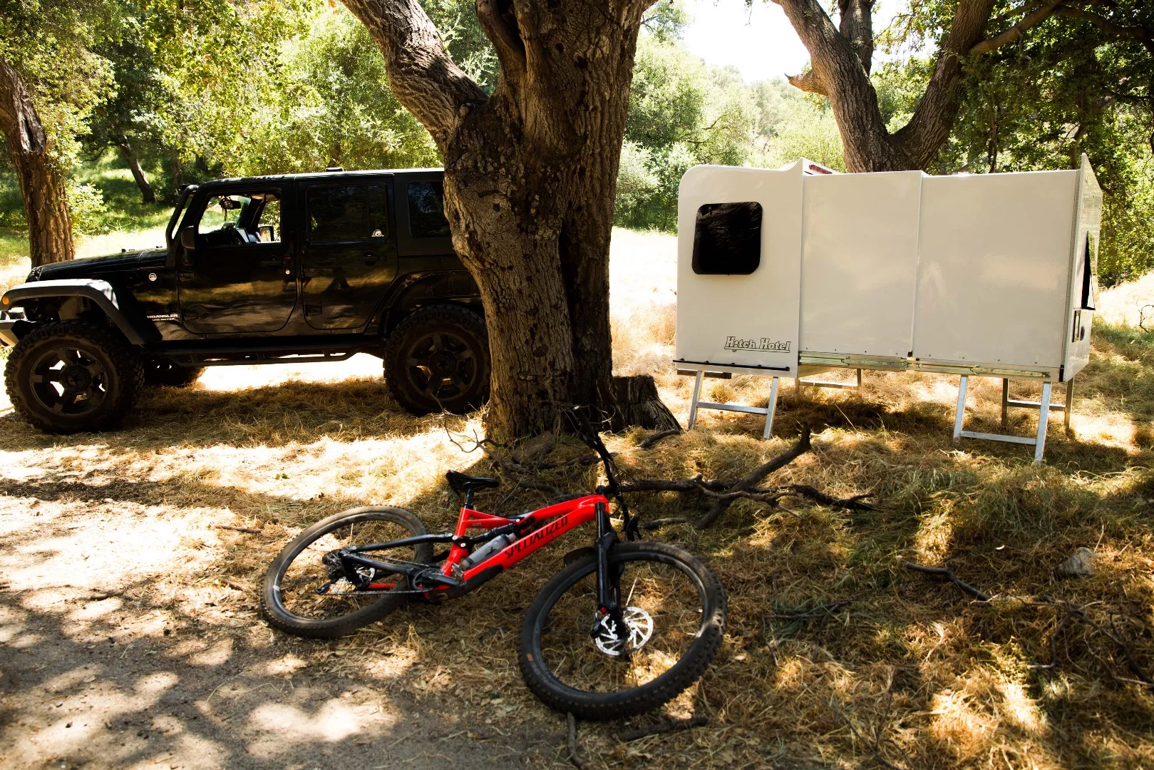 Carry your bikes and gear to camp inside the Hitch Hotel, then stretch it out and get a good night's rest
