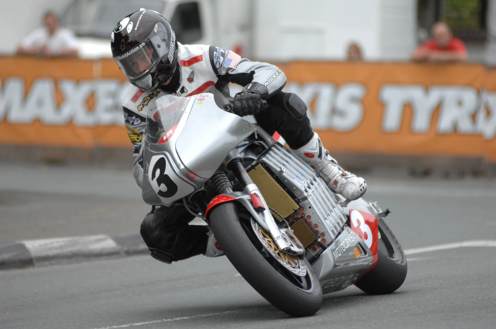 Mark Miller on the Motoczysz at Querterbridge during practice for the 2011 Isle of Man TT Zero race