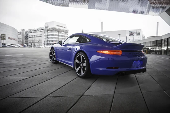 Styling details include the 44 mm wider body seen on the 911 Carrera 4 models with a rear wheel drive platform