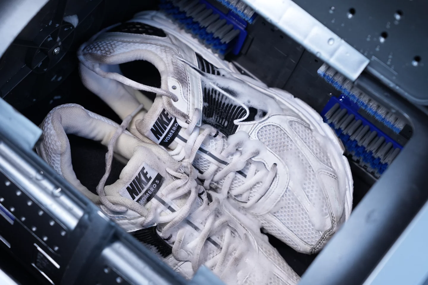 The machine can accommodate up to two pairs of adult shoes per cycle