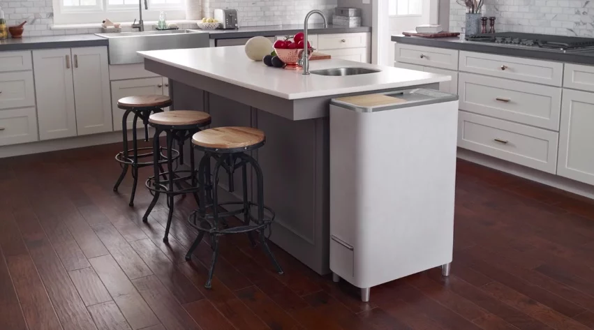 The Zera Food Recycler (at end of kitchen island) composts kitchen waste