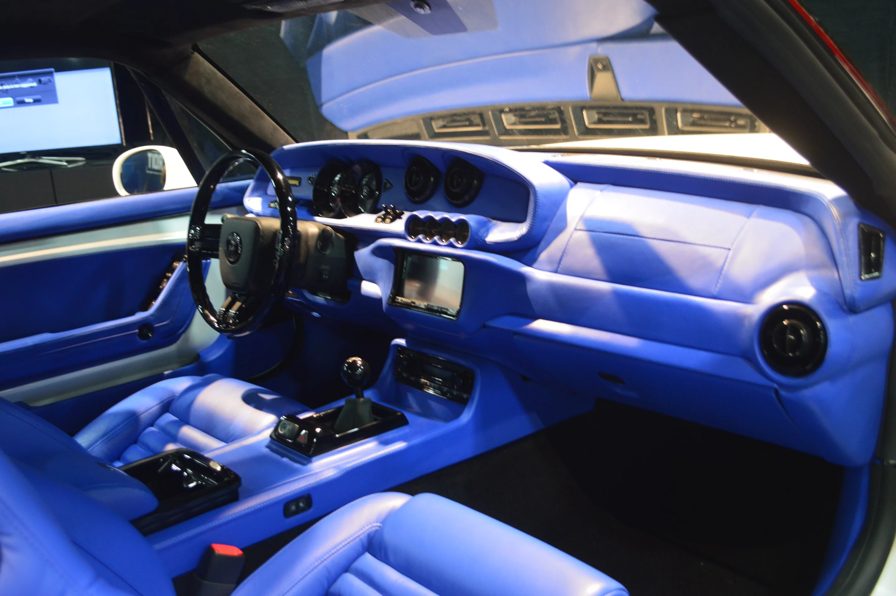 The exterior is retro muscle, but the interior is up-to-date style and tech