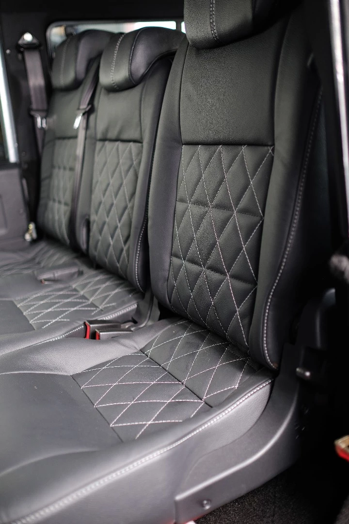 Rear seat passengers are treated to quilted leather as well