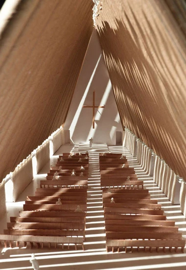 Ninety-eight cardboard tubes form the cathedral's structural beams, and shipping containers also figure in the cathedral's construction (Photo: Shigeru Ban Architects)