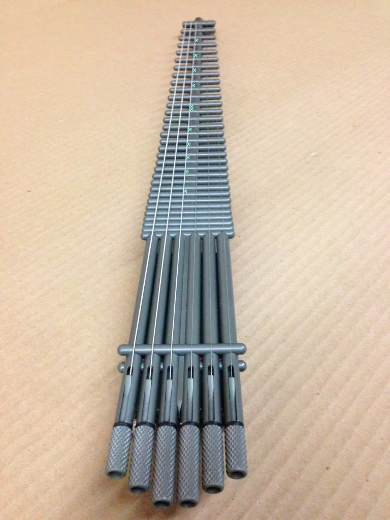 A special Armed Forces Gittler Guitar, with a weapons-grade finish and green LEDs