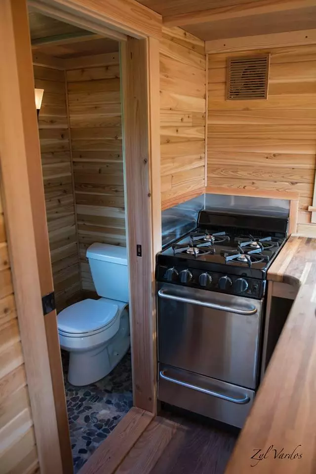 The Fuchsia kitchen includes propane-powered range oven