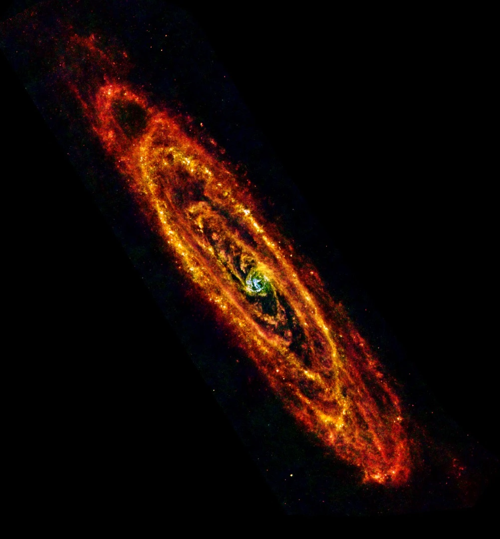 The Andromeda galaxy from ESA’s Herschel space observatory, cool lanes of forming stars are revealed in the finest detail yet