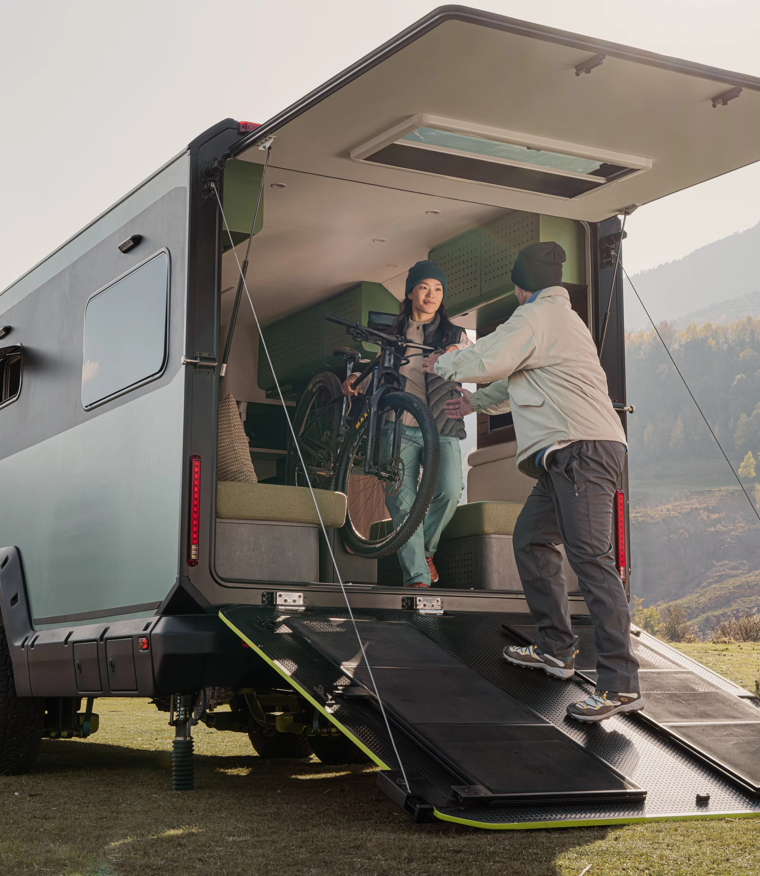 The power-lowered deck features multiple positions to serve as both a terrace and a load ramp