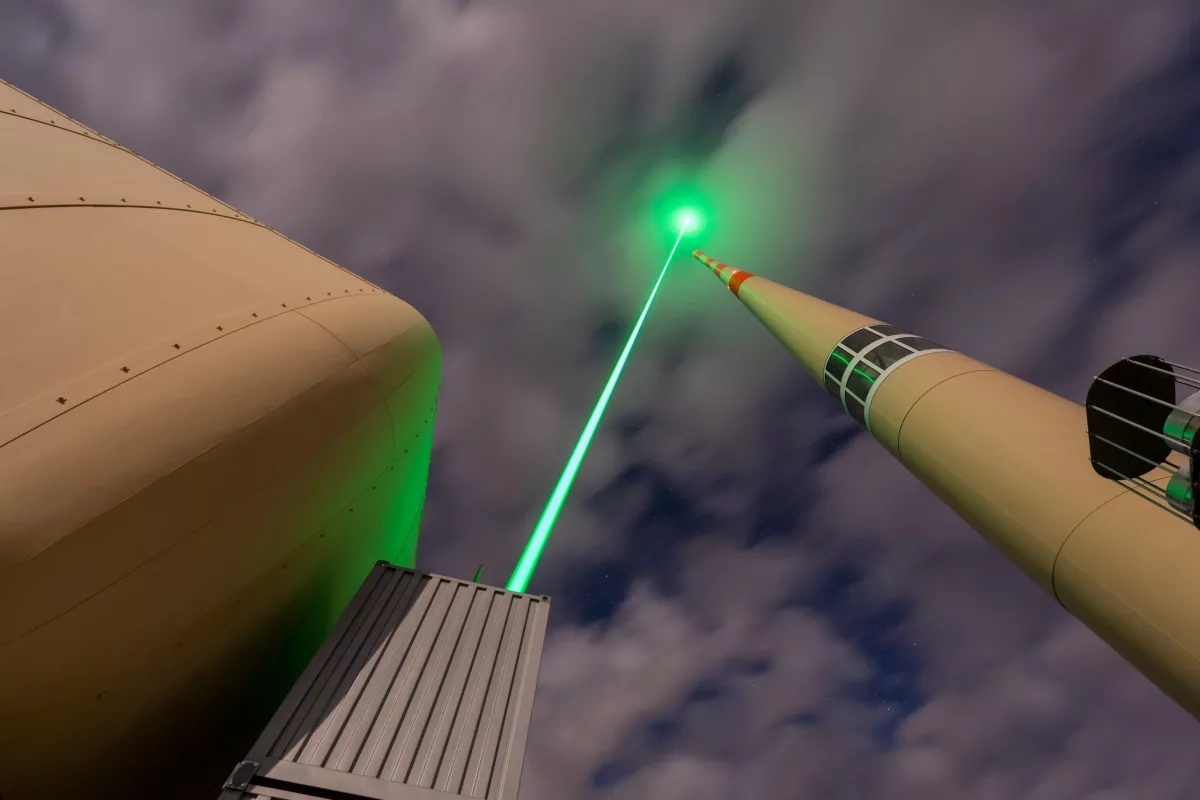 The Laser Lightning Rod is beamed near the top of a tower on the summit of Säntis, in the Swiss Alps