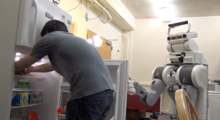The anticipatory robot helping to open a fridge door