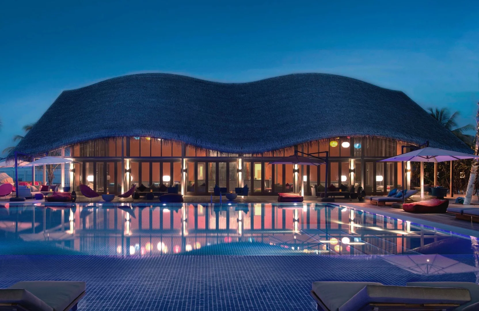 The Finolhu Villas project's photovoltaic panels are reported to generate more electricity than is needed by the resort