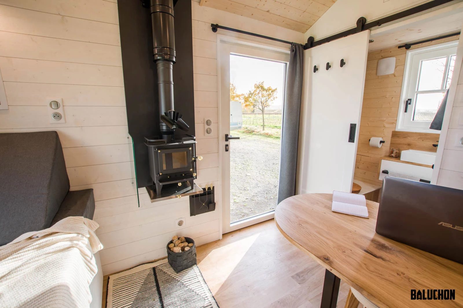 L'atelier de Saint-Joseph is kept warm with a small wood-burning stove