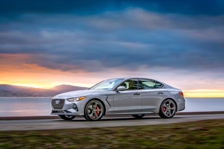 The new G70 is performance-focused and has an updated design based on the other G sedans in the Genesis line, emphasizing a longer hood through shorter overhangs and higher beltline for a more athletic appearance