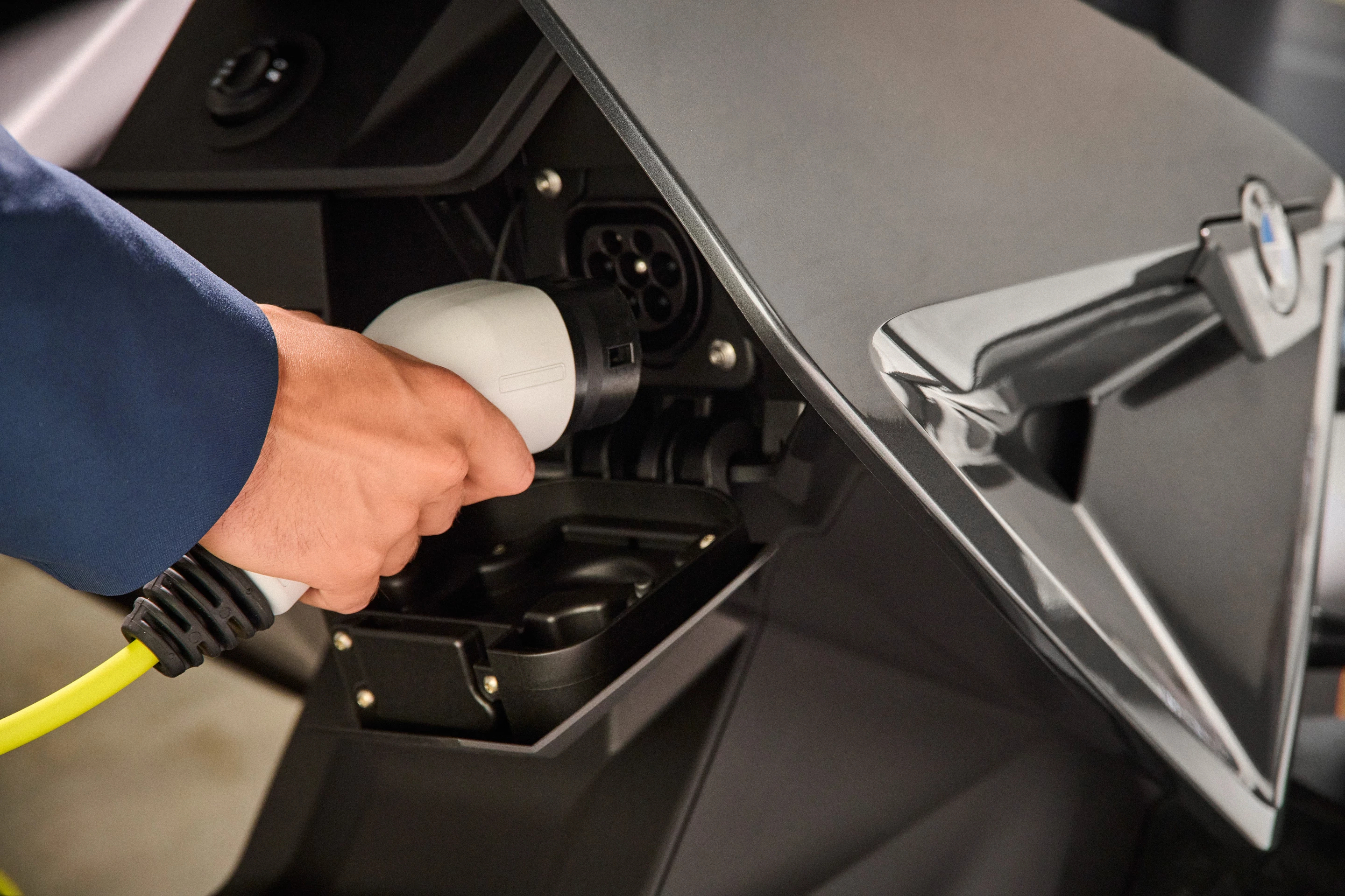 The charging port is located to the front of the CE 04