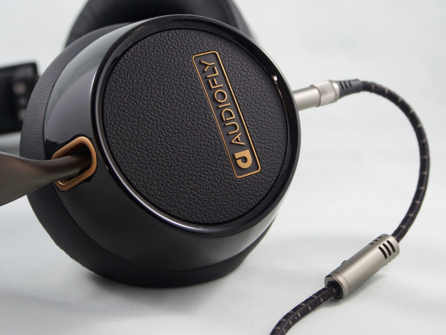 The AF240s ship with a rugged, fabric-covered, removable cable, complete with smart-phone compatible microphone and multi-purpose button