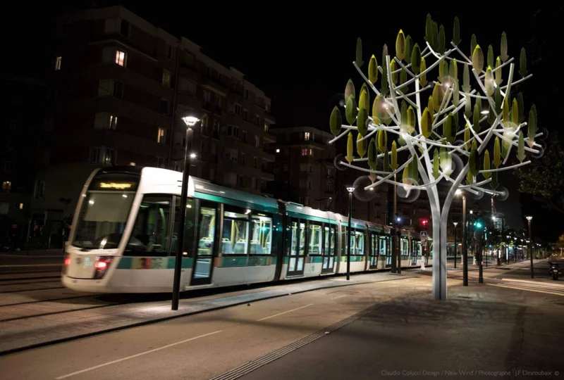 The steel tree stands 11 m (36 ft) tall and measures 8 m (26 ft) in diameter