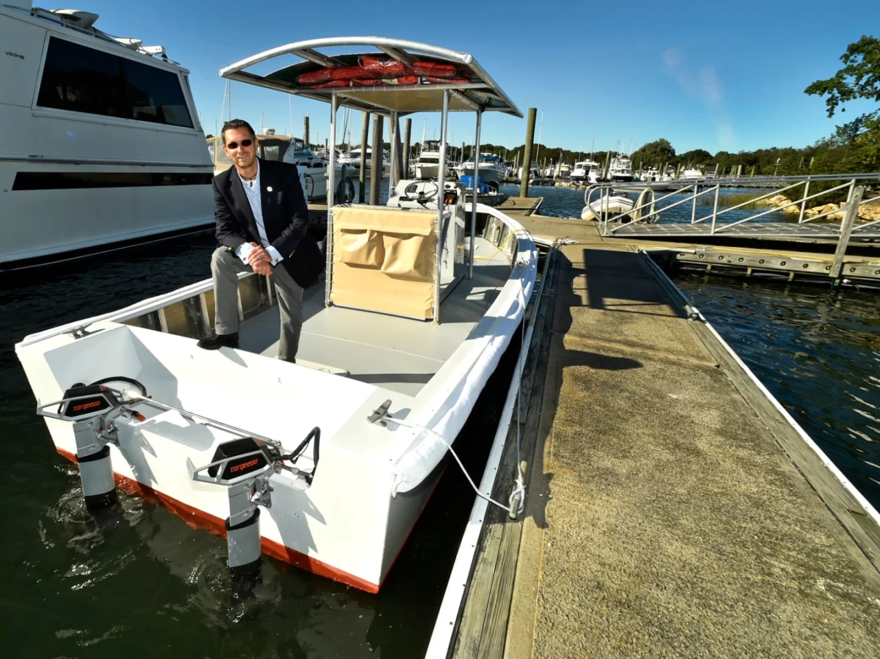Propulsion comes from two Torqeedo Cruise 4.0 outboard motors that get their juice from four Torqeedo Power 48 Li-ion battery banks, recharged by eight 100-watt solar panels