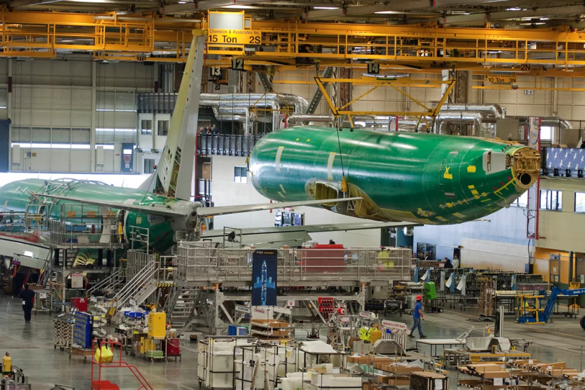The fuselage for the first P-8A Poseidon production aircraft. The sixth test aircraft T6 is in final assembly in the background (Photo: Boeing)