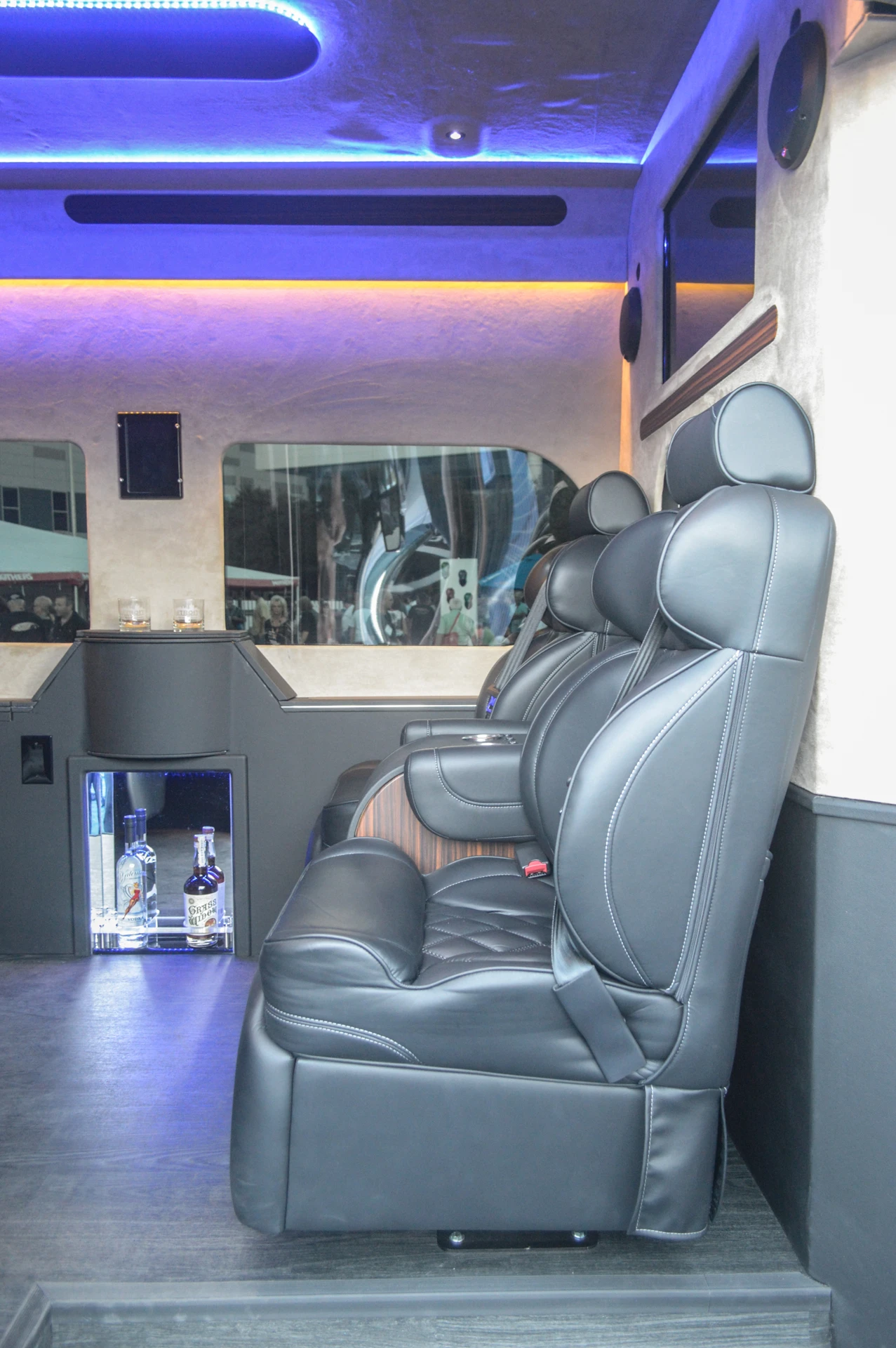 Detroit Custom Coach's Ford Transit van has a luxurious interior with minibar, 32-in Jensen HD TV and iPad control system (Photo: C.C. Weiss/Gizmag)