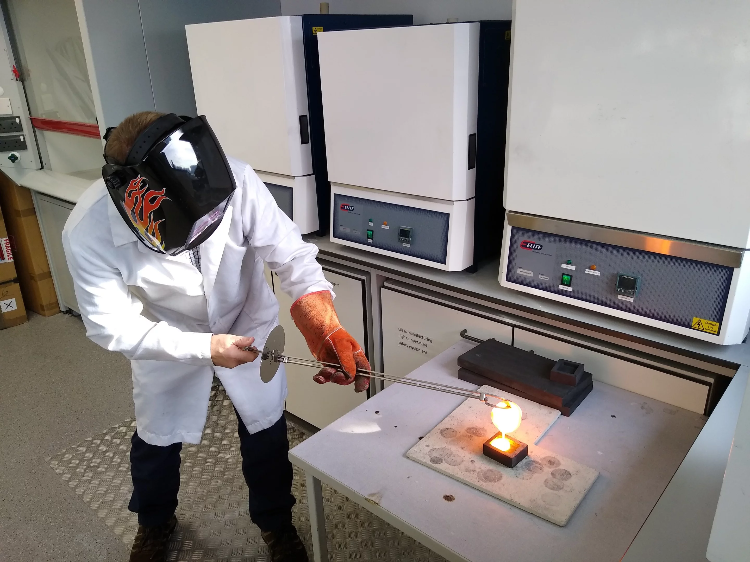 Rods of the material are formed by pouring molten glass into molds