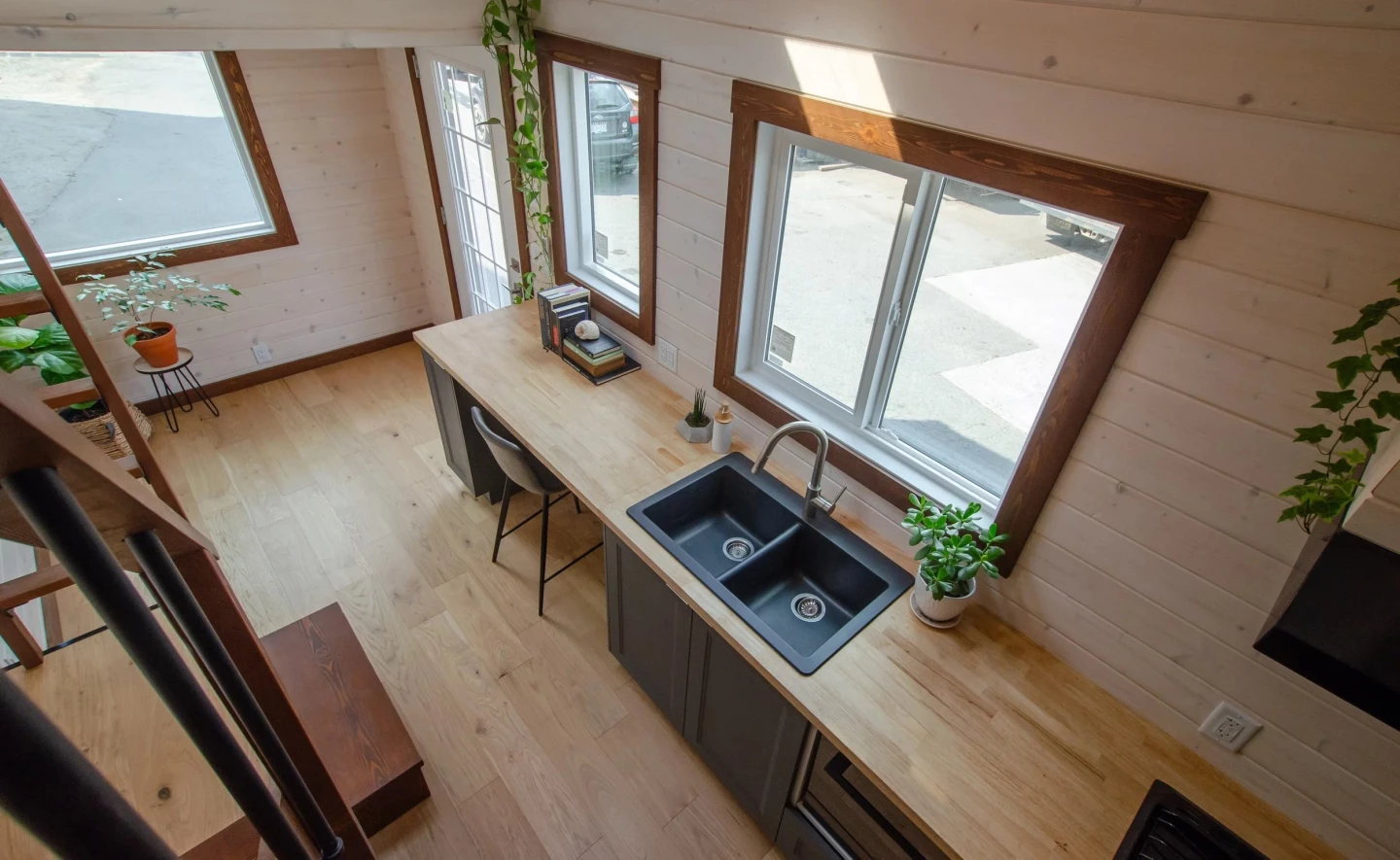 The Pacific Wren's desk area is integrated into the kitchen's wooden countertop