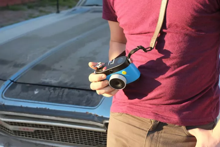 The Otto camera features a crank that can be popped out from the top and turned to instantly capture animated GIFs