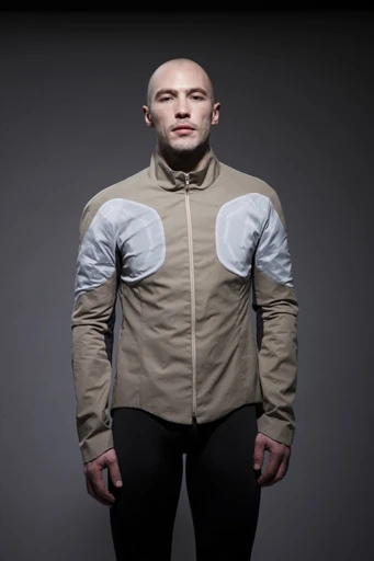 The Sporty Supaheroe comes in a rather fetching creamy-beige sort of hue, with white webbing over the LED circuits on the upper arms and torso